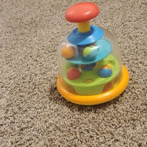 Push and spin toy